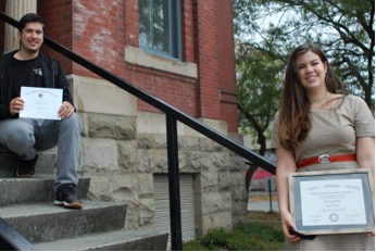 Photo of students in front of academic hall.