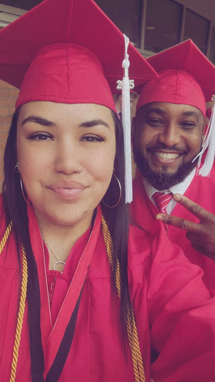 Two SVC graduates smilling on the 2025 commencement day