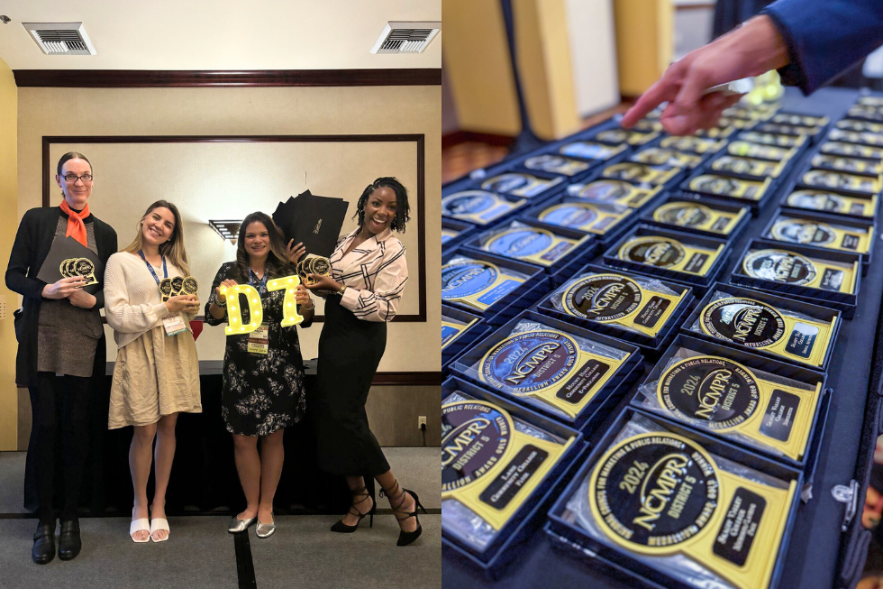 marketing team holding awards