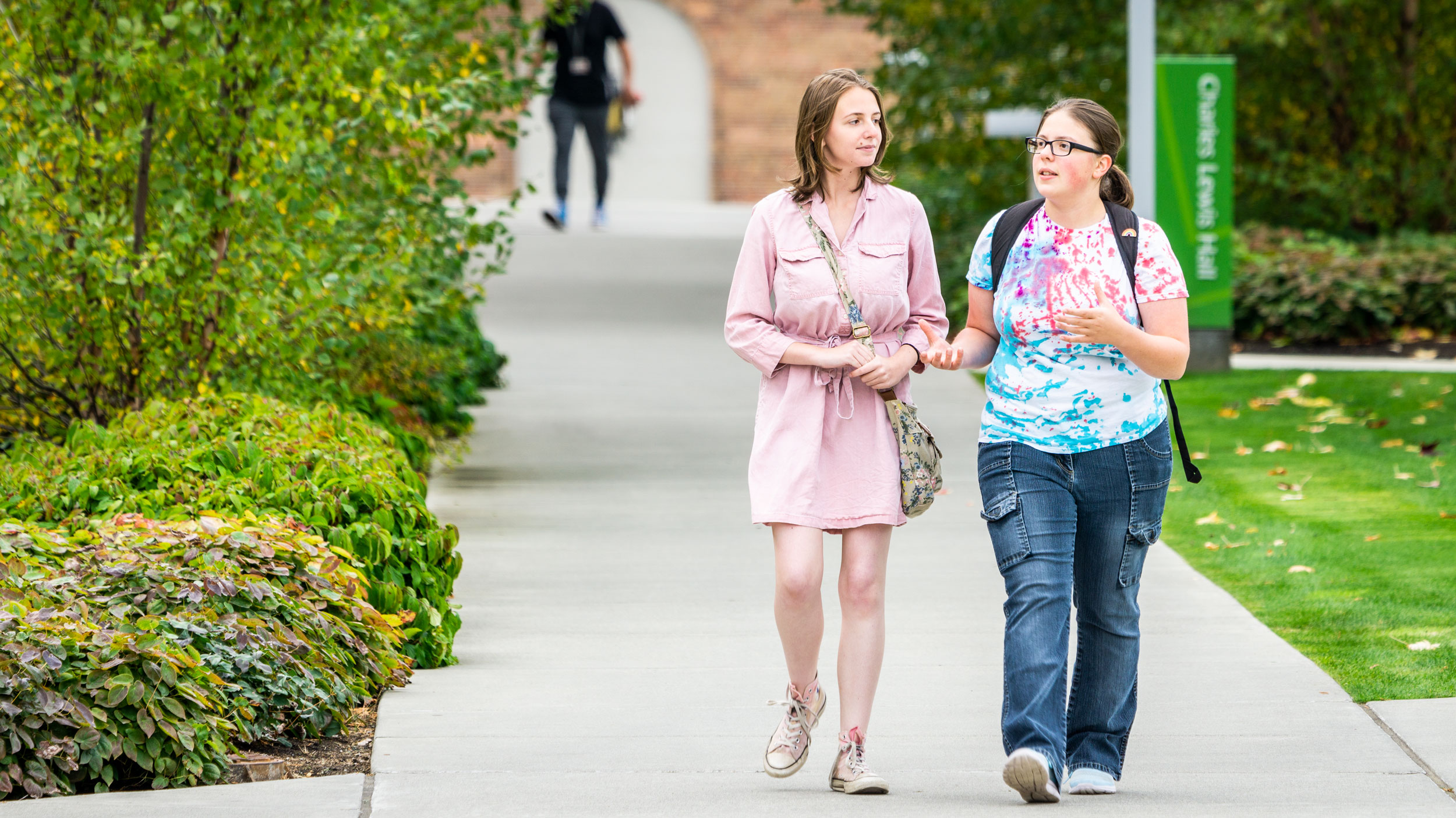 Students walking on campus Students walking on campus