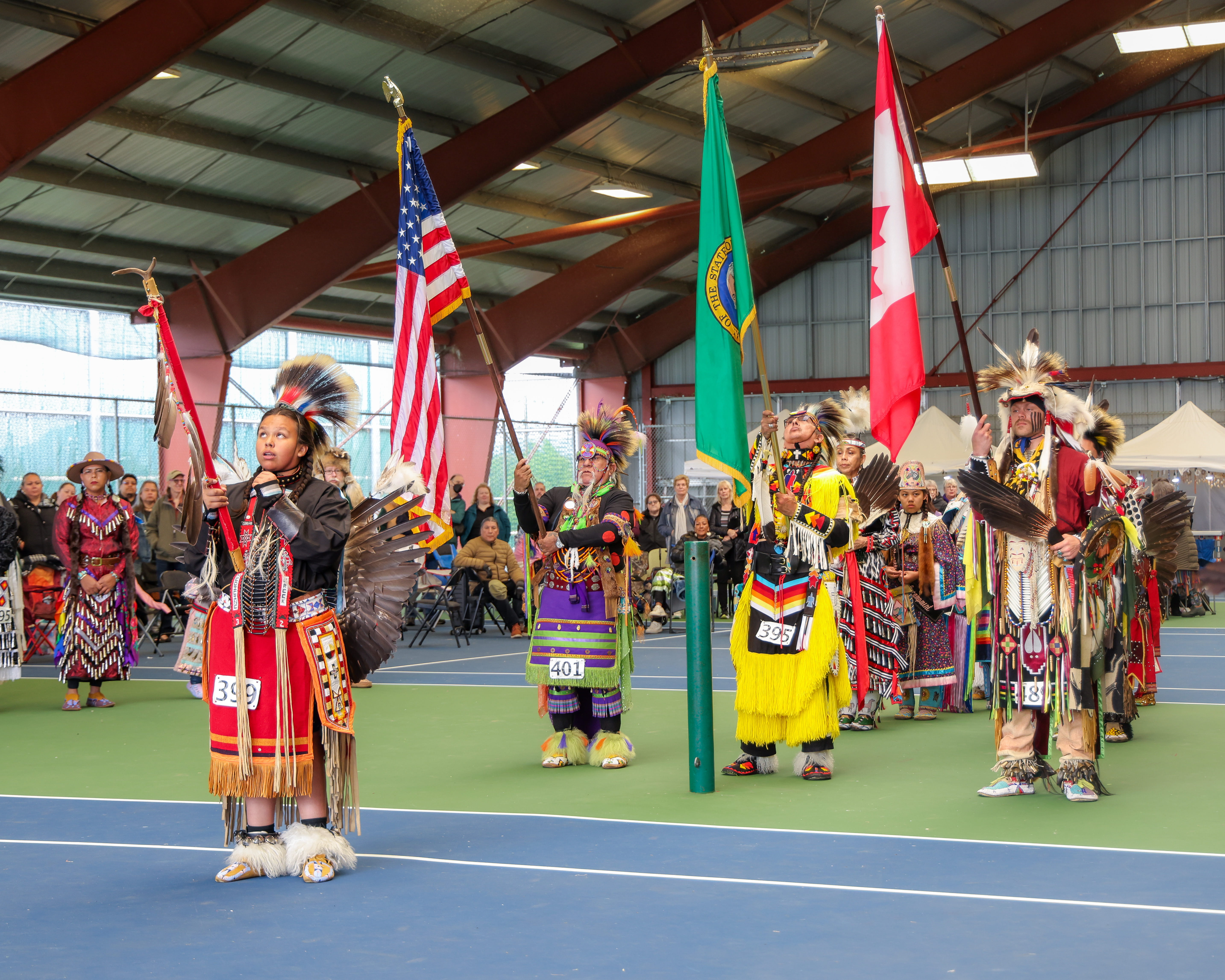 Group of dancers holding flags