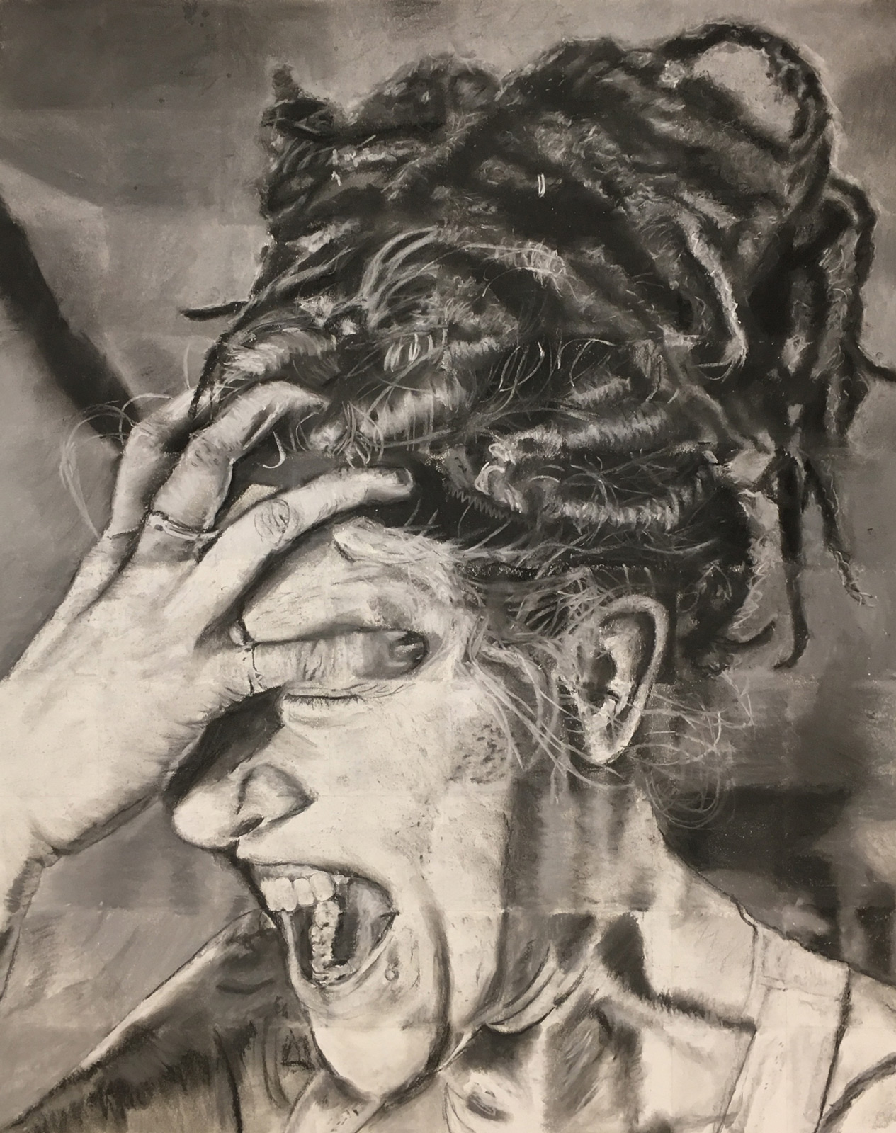 Self-portrait in charcoal on paper by an SVC art student