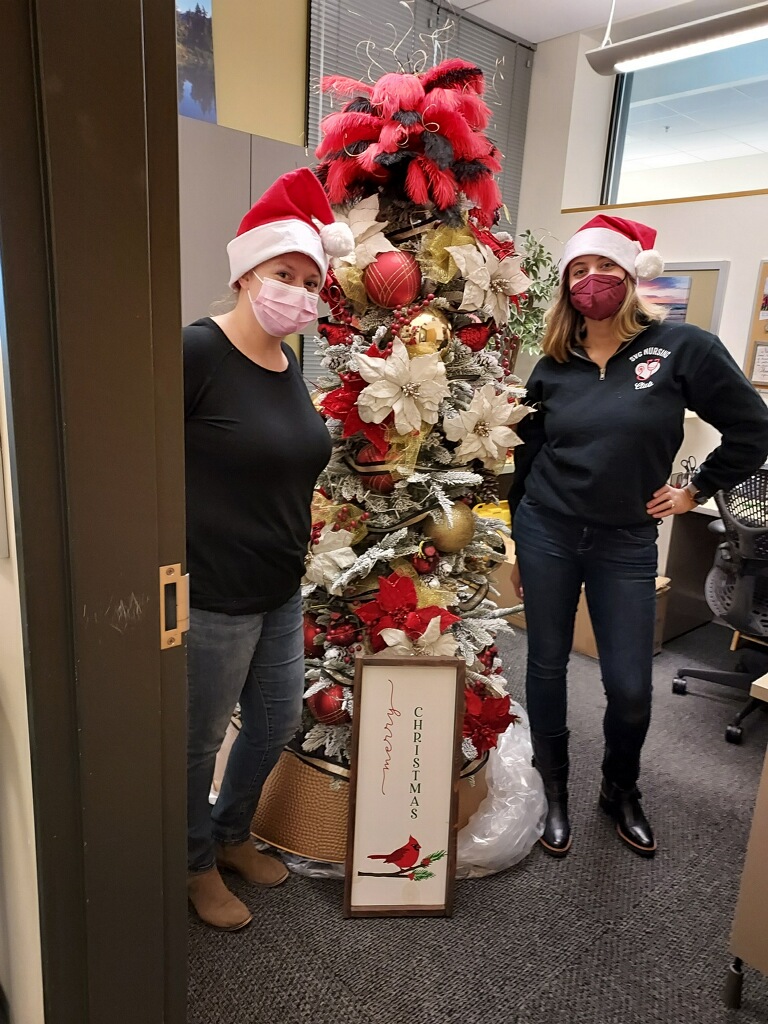 SVC Student Nurse Club members Jessica Travis and Alaina Schwartz put the finishing touches on the club’s community service project for Skagit Valley Hospital’s Festival of Trees and Silent Auction.
