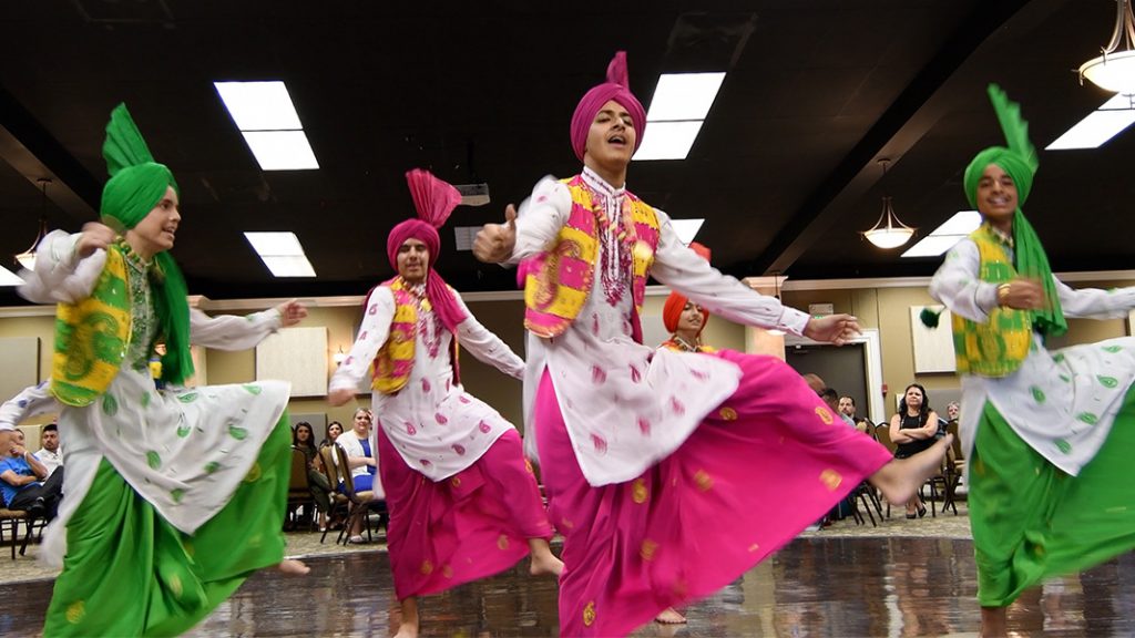 Dancers performing Bhangra dance