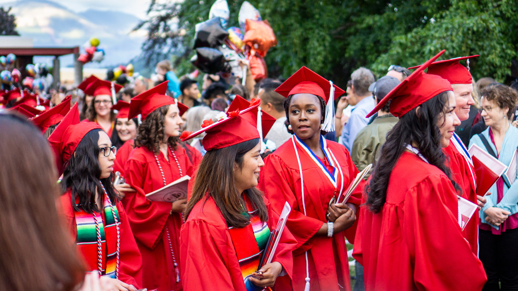 Student procession leaving DuVall Pavilion after commencement ceremony.